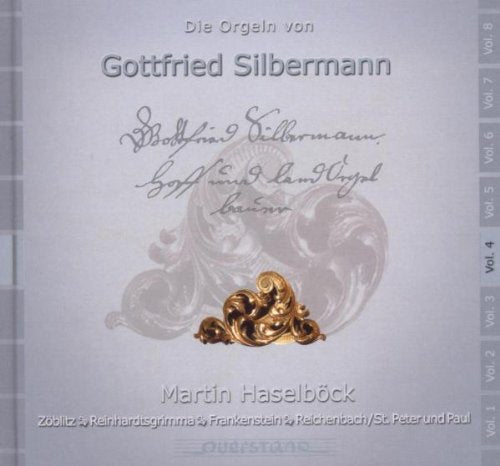 A CD cover with a gold ornament on a light gray background.