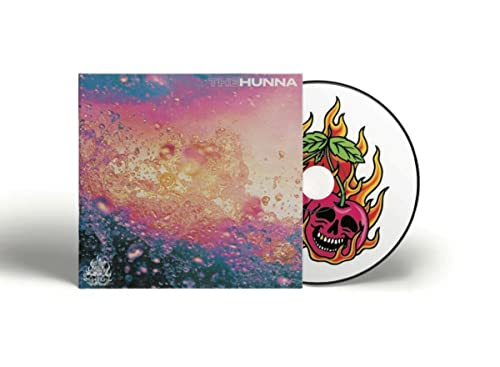 CD case with colorful, abstract art and a flaming cherry skull.