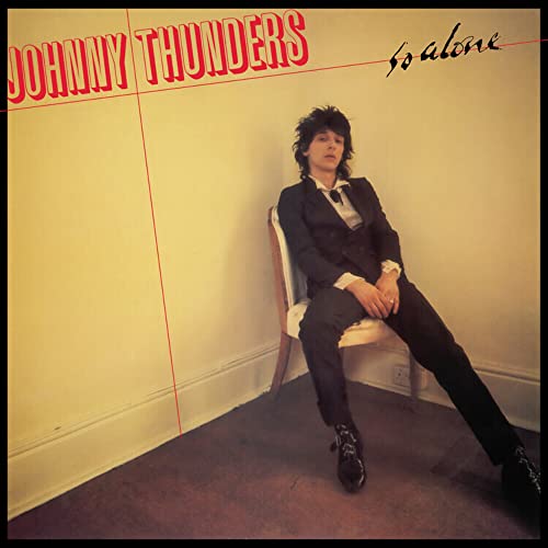 Johnny Thunders album cover: portrait of a man in a suit, seated.