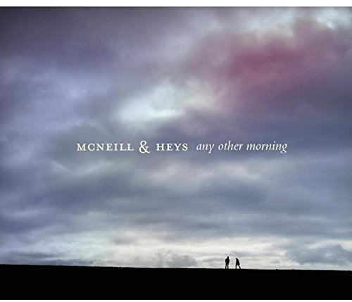 "CD cover featuring two silhouetted figures on a hill under a cloudy sky."