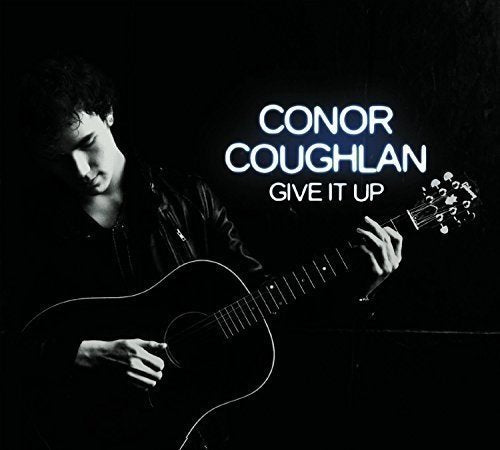 "Black and white image of a man playing guitar with text 'Conor Coughlan Give It Up'."
