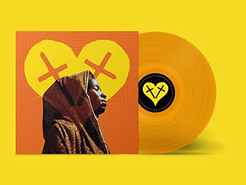 Vinyl record and album cover featuring a woman in headwrap.