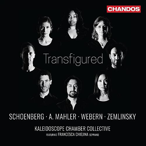 Black and white portrait of nine musicians, album cover for “Transfigured.”