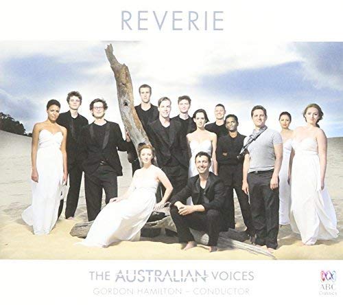 CD cover: group of people on a beach with driftwood.