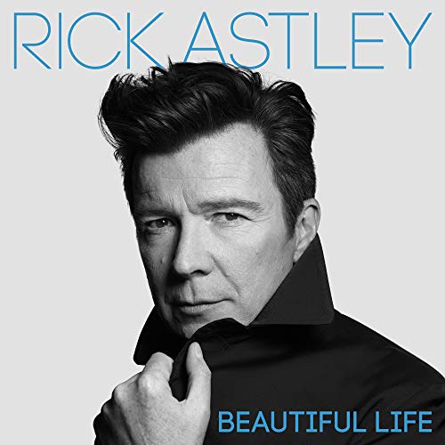 Black and white portrait of Rick Astley on a gray background with blue text overlay.