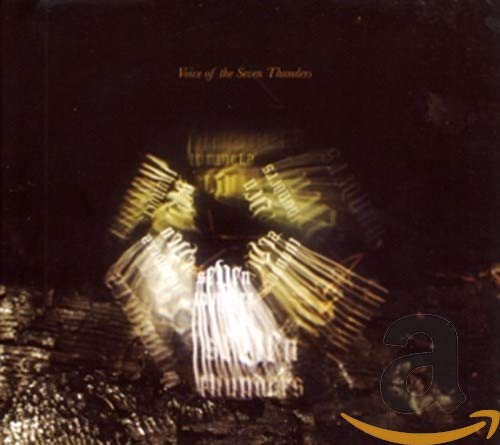CD cover with abstract golden light streaks on a dark background.