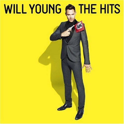 Man in grey suit holding a gun with a red "BANG" flag on yellow background.