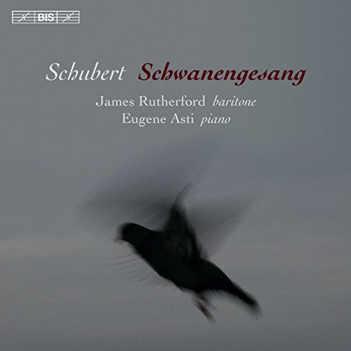 The image is a CD cover for a classical music album. The alt text is: "CD cover with blurry black bird in flight on grey background."