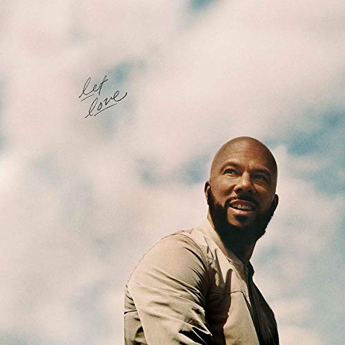 "Album cover with a smiling man against a cloudy sky, 'let love' written above."