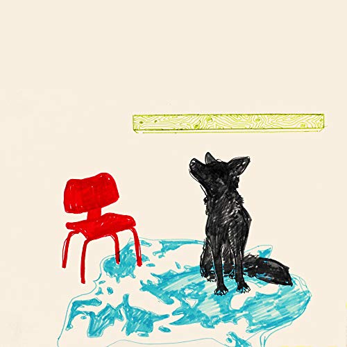 Black dog sitting with a red chair and blue wavy ground.