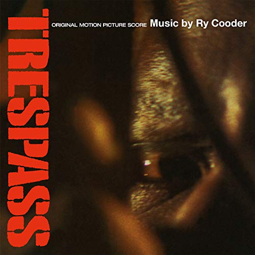 "TRESPASS" vinyl album cover with a close-up of a person's eye.