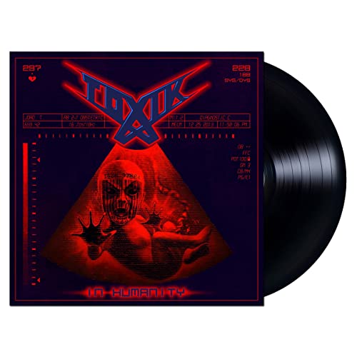 Vinyl record with cover art featuring a red, distorted face and “TOXIK” logo.
