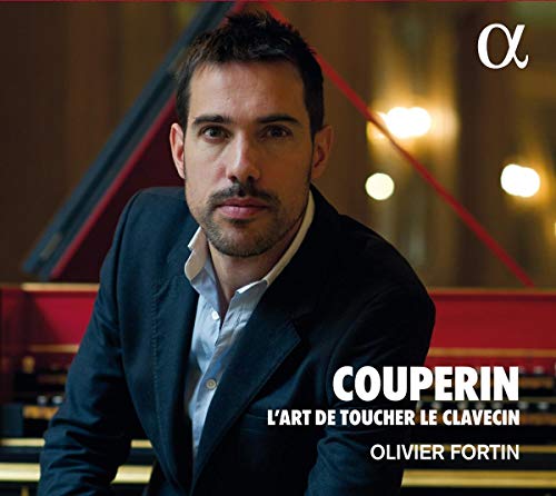 Man in suit in front of a grand piano, with white text overlay.