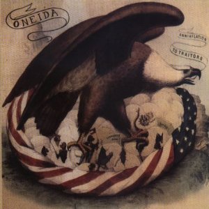 CD cover: Eagle with prey amidst an American flag, sepia tone.