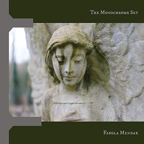 "CD cover featuring a stone angel statue with closed eyes, dark green borders."