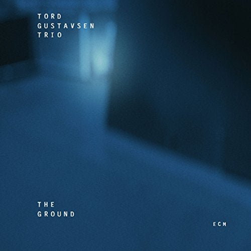 "Blue-toned album cover with 'Tord Gustavsen Trio' and 'The Ground' in white text."