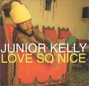 "Album cover featuring a man sitting on a red ornate chair."