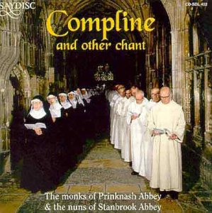 CD cover featuring monks and nuns in a church interior.