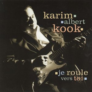 CD cover featuring a man with a guitar, text “karim albert kook”.