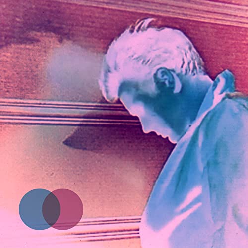 Vinyl record cover with a blue-toned portrait of a man with his head down.