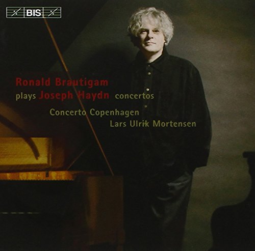 CD cover featuring a man standing beside a grand piano with text overlay.
