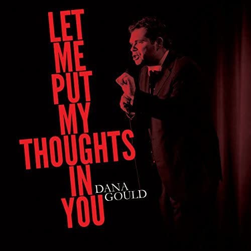 Dana Gould album cover featuring a comedian with red text on black.