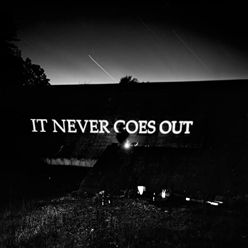Black and white album cover with text and a rooftop scene.