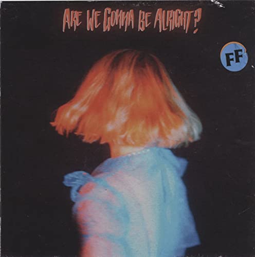 CD cover: woman with orange hair seen from behind, dark background.