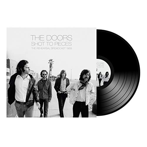 Black vinyl record with cover art featuring a black-and-white image of The Doors.