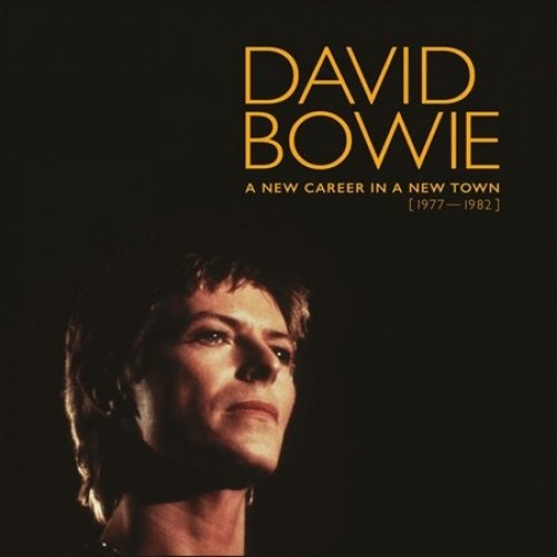 David Bowie album cover: portrait with golden text, "A New Career...