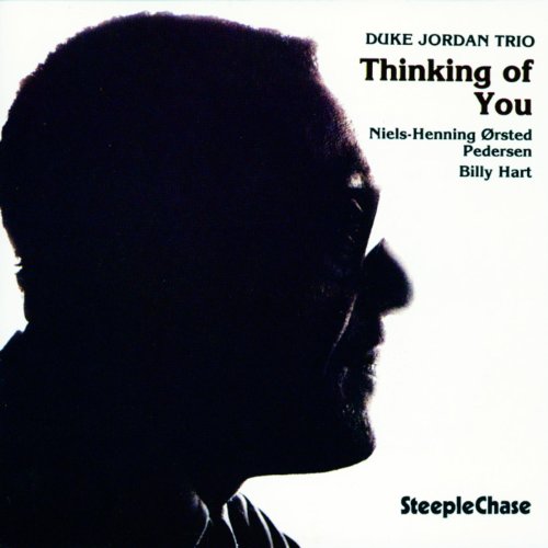 CD cover with a black silhouette of a man's profile against a white background.