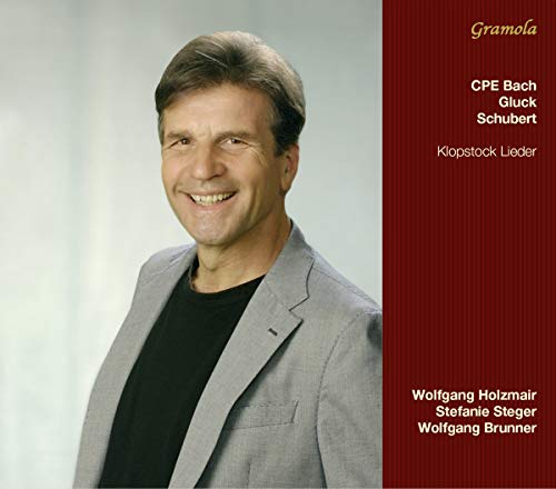CD cover featuring a portrait of a smiling man and musical composers’ names.