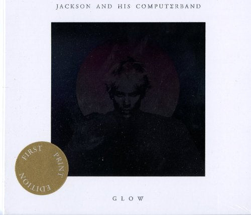 Album cover with a man in front of a circular background, on a white border.