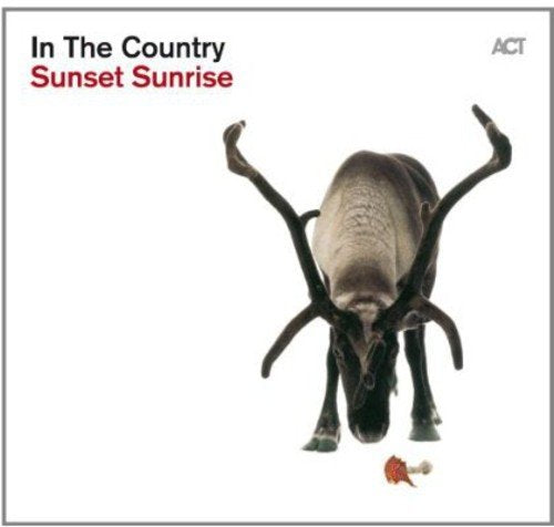 CD cover featuring a reindeer looking down at a small object on white background.
