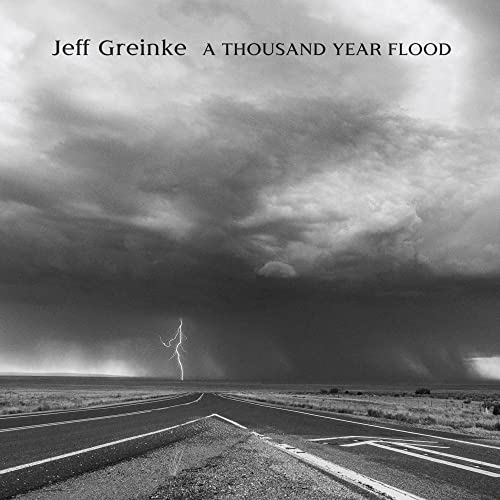 CD cover: stormy landscape with a road, titled "A Thousand Year Flood".