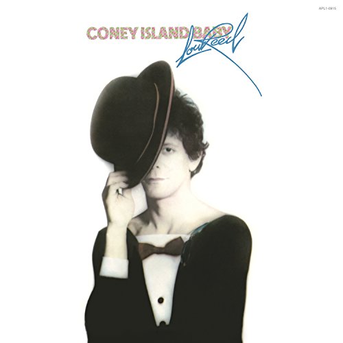 Lou Reed album cover: man in suit with hat obscuring face.