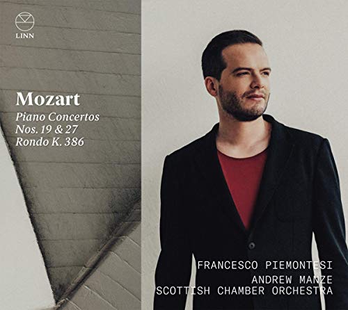 Mozart CD cover featuring a man in a black jacket and red shirt.