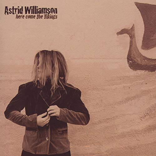 CD cover: woman in jacket, Viking ship silhouette, sepia tone.