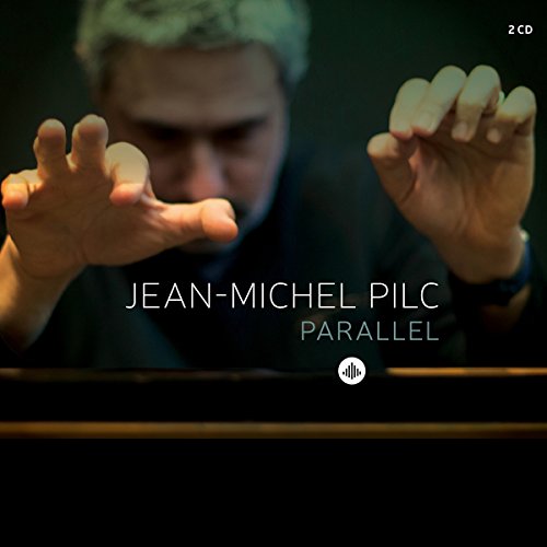Jean-Michel Pilc album "Parallel" cover with pianist’s hands and face.