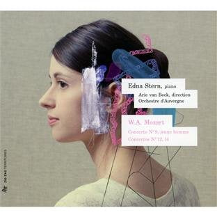 CD cover with a woman's portrait and colorful hair decorations.
