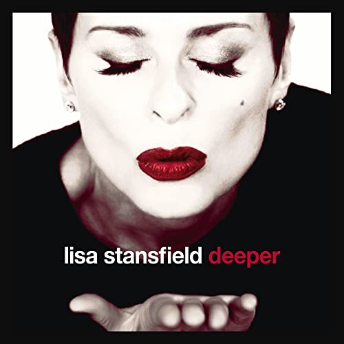Close-up of Lisa Stansfield with red lips, album cover for "Deeper".