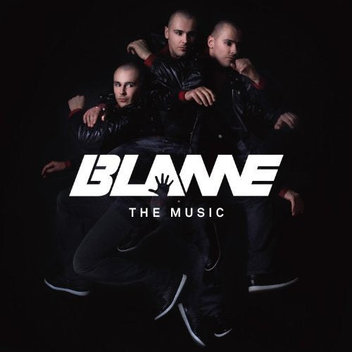 "CD cover with 'BLAME THE MUSIC' text and four men in black clothing."