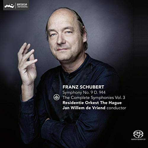 CD cover with a man and white text on a dark background.