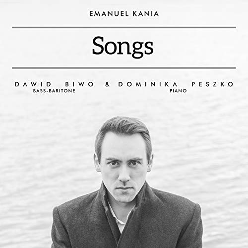 Black and white album cover featuring a man in a coat standing by water.