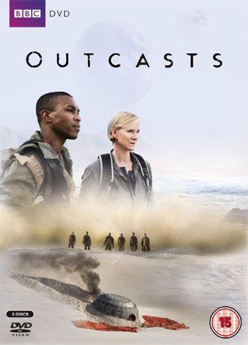DVD cover for "Outcasts" featuring two people and a crashed spaceship in a desert.