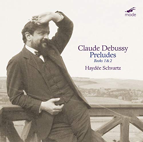 "CD cover featuring a man in a suit and hat standing outdoors."
