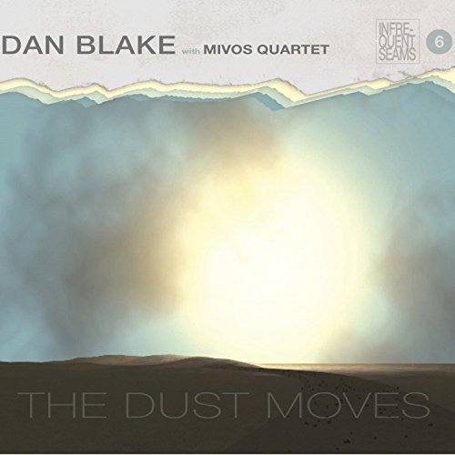The image depicts a DVD cover with a desert landscape and abstract sky.