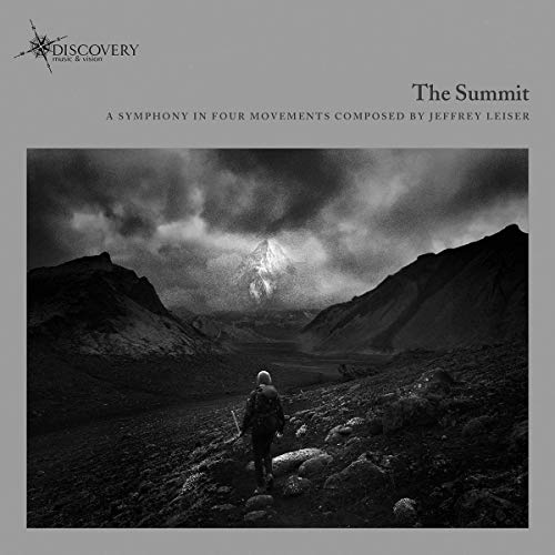 CD cover: grayscale mountain landscape with a lone hiker.