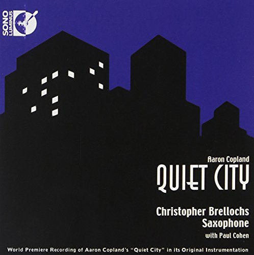 "CD cover with city skyline silhouette and 'Quiet City' text on dark blue background."
