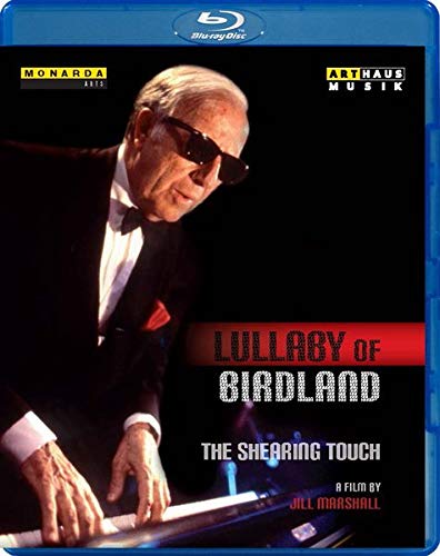 Blu-ray case with a photo of a man playing piano, wearing sunglasses and a tuxedo.